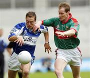 13 August 2006; Chris Conway, Laois, in action against James Nallen, Mayo. Bank of Ireland All-Ireland Senior Football Championship Quarter-Final, Mayo v Laois, Croke Park, Dublin. Picture credit; Damien Eagers / SPORTSFILE