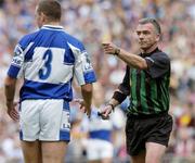 13 August 2006; Referee Pat McEnaney awards a final free to Mayo in the last few seconds as Laois's Darren Rooney looks on. Bank of Ireland All-Ireland Senior Football Championship Quarter-Final, Mayo v Laois, Croke Park, Dublin. Picture credit; Damien Eagers / SPORTSFILE