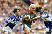 13 August 2006; Ciarán McDonald, Mayo, in action against Billy Sheehan, right, and Chris Conway, Laois. Bank of Ireland All-Ireland Senior Football Championship Quarter-Final, Mayo v Laois, Croke Park, Dublin. Picture credit; Matt Browne  / SPORTSFILE