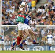 13 August 2006; Barry Moran, Mayo, in action against Billy Sheehan and Padraig Clancy, Laois. Bank of Ireland All-Ireland Senior Football Championship Quarter-Final, Mayo v Laois, Croke Park, Dublin. Picture credit; Matt Browne  / SPORTSFILE