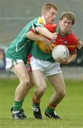 13 August 2006; Paul Cashin, Carlow, in action against Michael Foley, Leitrim.Tommy Murphy Cup, Semi-Final, Carlow v Leitrim, St. Brendan's Park, Birr, Co. Offaly. Picture credit; Ray Lohan / SPORTSFILE
