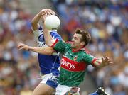 13 August 2006; Brendan Quigley, Laois, in action against Ronan McGarrity, Mayo. Bank of Ireland All-Ireland Senior Football Championship Quarter-Final, Mayo v Laois, Croke Park, Dublin. Picture credit; Ray McManus / SPORTSFILE