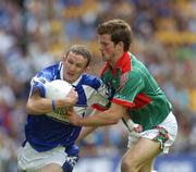 13 August 2006; Gary Kavanagh, Laois, in action against Trevor Howley, Mayo. Bank of Ireland All-Ireland Senior Football Championship Quarter-Final, Mayo v Laois, Croke Park, Dublin. Picture credit; Ray McManus / SPORTSFILE