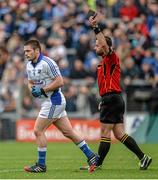 12 July 2014; Robbie Kehoe, Laois, leaves the field as he is shown the black card by referee David Gough. GAA Football All-Ireland Senior Championship Round 3A, Laois v Tipperary. O'Moore Park, Portlaoise, Co. Laois. Picture credit: Piaras Ó Mídheach / SPORTSFILE