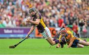 12 July 2014; Liam Óg McGovern, Wexford, is fouled by Jack Browne, Clare. This tackle resulted in Jack Browne being sent off after receiving a second yellow card. GAA Hurling All-Ireland Senior Championship Round 1 Replay, Clare v Wexford, Wexford Park, Wexford. Picture credit: Dáire Brennan / SPORTSFILE