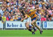 12 July 2014; Liam Óg McGovern, Wexford, in action against Jack Browne, Clare. GAA Hurling All-Ireland Senior Championship Round 1 Replay, Clare v Wexford, Wexford Park, Wexford. Picture credit: Dáire Brennan / SPORTSFILE