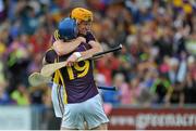12 July 2014; Wexford players Podge Doran, right, and Jack Guiney celebrate at the final whistle. GAA Hurling All-Ireland Senior Championship Round 1 Replay, Clare v Wexford, Wexford Park, Wexford. Picture credit: Dáire Brennan / SPORTSFILE