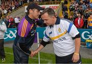12 July 2014; Wexford manager Liam Dunne and Clare manager Davy Fitzgerald shake hands after the game. GAA Hurling All-Ireland Senior Championship Round 1 Replay, Clare v Wexford, Wexford Park, Wexford. Picture credit: Ray McManus / SPORTSFILE