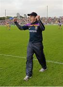 12 July 2014; Wexford manager Liam Dunne cheers on his side in the final moments of the game. GAA Hurling All-Ireland Senior Championship Round 1 Replay, Clare v Wexford, Wexford Park, Wexford. Picture credit: Ray McManus / SPORTSFILE