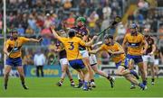 12 July 2014; Conor McDonald, Wexford, in action against David McInerney, Clare. GAA Hurling All-Ireland Senior Championship Round 1 Replay, Clare v Wexford, Wexford Park, Wexford. Picture credit: Dáire Brennan / SPORTSFILE