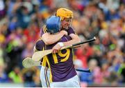 12 July 2014; Wexford players Podge Doran, right, and Jack Guiney celebrate at the final whistle. GAA Hurling All-Ireland Senior Championship Round 1 Replay, Clare v Wexford, Wexford Park, Wexford. Picture credit: Dáire Brennan / SPORTSFILE