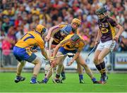 12 July 2014; Rory Jacob, left, and Liam Óg McGovern, Wexford, in action against Clare players, from left, Seadna Morey, Cian Dillon, and Jack Browne. GAA Hurling All-Ireland Senior Championship Round 1 Replay, Clare v Wexford, Wexford Park, Wexford. Picture credit: Dáire Brennan / SPORTSFILE