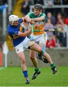 12 July 2014; Rory Hanniffy, Offaly, in action against Patrick Maher, Tipperary. GAA Hurling All-Ireland Senior Championship Round 2, Tipperary v Offaly. O'Moore Park, Portlaoise, Co. Laois. Picture credit: Piaras Ó Mídheach / SPORTSFILE