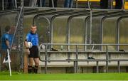 12 July 2014; Match referee Fergal Kelly takes shelter from the rain. GAA Football All-Ireland Senior Championship Round 3A, Sligo v Limerick, Markievicz Park, Sligo. Picture credit: Pat Murphy / SPORTSFILE