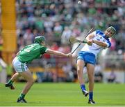 13 July 2014; Cormac Curran, Waterford, in action against Sean Finn, Limerick. Electric Ireland Munster GAA Hurling Minor Championship Final, Limerick v Waterford, Pairc Uí Chaoimh, Cork. Picture credit: Brendan Moran / SPORTSFILE