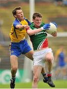 13 July 2014; Matthew Ruane, Mayo, in action against Tom Butler, Roscommon. Electric Ireland Connacht GAA Football Minor Championship Final, Mayo v Roscommon, Elverys MacHale Park, Castlebar, Co. Mayo. Picture credit: Ray Ryan / SPORTSFILE
