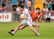13 July 2014; Colm Cavanagh, Tyrone, in action against Aidan Forker, Armagh. GAA Football All-Ireland Senior Championship Round 2B, Tyrone v Armagh, Healy Park, Omagh, Co. Tyrone. Picture credit: Ramsey Cardy / SPORTSFILE