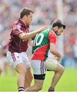 13 July 2014; Kevin McLoughlin, Mayo, in action against Eddie Hoare, Galway. Connacht GAA Football Senior Championship Final, Mayo v Galway, Elverys MacHale Park, Castlebar, Co. Mayo. Picture credit: Ray Ryan / SPORTSFILE