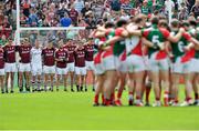 13 July 2014; Mayo players huddle as Galway prepare for the National Athem. Connacht GAA Football Senior Championship Final, Mayo v Galway, Elverys MacHale Park, Castlebar, Co. Mayo. Picture credit: Ray Ryan / SPORTSFILE