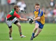 13 July 2014; Noel Gatley, Roscommon, in action against Jason Forkan, Mayo. Electric Ireland Connacht GAA Football Minor Championship Final, Mayo v Roscommon, Elverys MacHale Park, Castlebar, Co. Mayo. Picture credit: Ray Ryan / SPORTSFILE