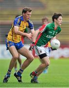 13 July 2014; Sean Conlon, Mayo, in action against Tom Butler, Roscommon. Electric Ireland Connacht GAA Football Minor Championship Final, Mayo v Roscommon, Elverys MacHale Park, Castlebar, Co. Mayo. Picture credit: Ray Ryan / SPORTSFILE