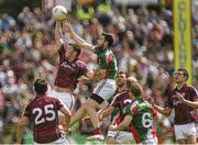 13 July 2014; Gareth Bradshaw, Galway, in action against Kevin McLoughlin, Mayo, as their team-mates await the breaking ball. Connacht GAA Football Senior Championship Final, Mayo v Galway, Elverys MacHale Park, Castlebar, Co. Mayo. Picture credit: Pat Murphy / SPORTSFILE