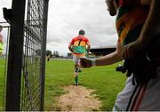13 July 2014; Carlow captain Benny Kavanagh leads his team out before the game. GAA Football All-Ireland Senior Championship Round 2B, Carlow v Clare, Dr Cullen Park, Carlow. Picture credit: Dáire Brennan / SPORTSFILE