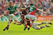 13 July 2014; Danny Cummins, Galway, in action against Donal Vaughan and Chris Barrett, Mayo. Connacht GAA Football Senior Championship Final, Mayo v Galway, Elverys MacHale Park, Castlebar, Co. Mayo. Picture credit: Ray Ryan / SPORTSFILE