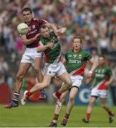 13 July 2014; Fionan O'Curraoin, Galway, in action against Colm Boyle, Mayo. Connacht GAA Football Senior Championship Final, Mayo v Galway, Elverys MacHale Park, Castlebar, Co. Mayo. Picture credit: David Maher / SPORTSFILE