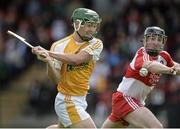 13 July 2014; Paul Shiels, Antrim, in action against Conor Quinn, Derry. Ulster GAA Hurling Senior Championship Final, Antrim v Derry, Owenbeg, Derry. Picture credit: Oliver McVeigh / SPORTSFILE