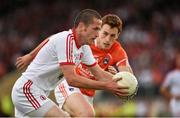 13 July 2014; Stephen O'Neill, Tyrone, in action against Charlie Vernon, Armagh. GAA Football All-Ireland Senior Championship Round 2B, Tyrone v Armagh, Healy Park, Omagh, Co. Tyrone. Picture credit: Barry Cregg / SPORTSFILE