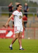 13 July 2014; A dejected Kyle Coney, Tyrone after the game. GAA Football All-Ireland Senior Championship Round 2B, Tyrone v Armagh, Healy Park, Omagh, Co. Tyrone. Picture credit: Barry Cregg / SPORTSFILE