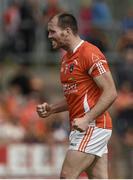 13 July 2014; Ciarán McKeever, Armagh, celebrates victory after the game. GAA Football All-Ireland Senior Championship Round 2B, Tyrone v Armagh, Healy Park, Omagh, Co. Tyrone. Picture credit: Barry Cregg / SPORTSFILE