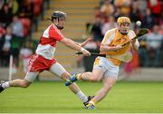 13 July 2014; Conor McGuinness, Antrim, in action against Eugene McGuckin, Derry. Ulster GAA Hurling Senior Championship Final, Antrim v Derry, Owenbeg, Derry. Picture credit: Oliver McVeigh / SPORTSFILE