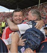 13 July 2014; Cork manager Jimmy Barry Murphy celebrates with team doctor Dr. Con Murphy, after victory over Limerick. Munster GAA Hurling Senior Championship Final, Cork v Limerick, Pairc Uí Chaoimh, Cork. Picture credit: Diarmuid Greene / SPORTSFILE