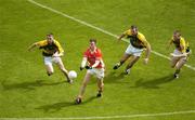 5 August 2006; Ronan Clarke, Armagh, under pressure from Kerry players Tomas O Se, Michael McCarthy and Marc O Se.  Bank of Ireland All-Ireland Senior Football Championship Quarter-Final, Armagh v Kerry, Croke Park, Dublin. Picture credit; Ray McManus / SPORTSFILE