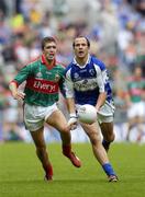 13 August 2006; Tom Kelly, Laois, in action against Pat Harte, Mayo. Bank of Ireland All-Ireland Senior Football Championship Quarter-Final, Mayo v Laois, Croke Park, Dublin. Picture credit; Damien Eagers / SPORTSFILE