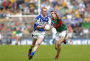 13 August 2006; Padraig Clancy, Laois, in action against Ronan McGarrity, Mayo. Bank of Ireland All-Ireland Senior Football Championship Quarter-Final, Mayo v Laois, Croke Park, Dublin. Picture credit; Damien Eagers / SPORTSFILE