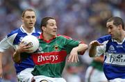13 August 2006; Peadar Gardiner, in action against Darren Rooney, right, and Brian McCormack, Mayo. Bank of Ireland All-Ireland Senior Football Championship Quarter-Final, Mayo v Laois, Croke Park, Dublin. Picture credit; Ray McManus / SPORTSFILE