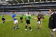 13 August 2006; Tipperary captain Joey McLoughney waits as referee Ger Hoey, Clare, greets the Kilkenny captain Colin McGrath. All-Ireland Minor Hurling Championship, Semi-Final, Kilkenny v Tipperary, Croke Park, Dublin. Picture credit; Ray McManus / SPORTSFILE