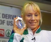 14 August 2006; Member of the Irish Athletics Team, Derval O'Rourke, who won a Silver medal in the Women's 100m Hurdles Final, on her arrival home from the European Championships in Gothenburg. Dublin Airport, Dublin. Picture credit: Damien Eagers / SPORTSFILE