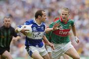 13 August 2006; Tom Kelly, Laois, in action against Ger Brady, Mayo. Bank of Ireland All-Ireland Senior Football Championship Quarter-Final, Mayo v Laois, Croke Park, Dublin. Picture credit; Damien Eagers / SPORTSFILE