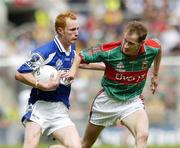 13 August 2006; Padraig Clancy, Laois, in action against James Nallen, Mayo. Bank of Ireland All-Ireland Senior Football Championship Quarter-Final, Mayo v Laois, Croke Park, Dublin. Picture credit; Damien Eagers / SPORTSFILE