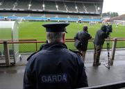 15 August 2006; A member of the Garda looks on during Republic of Ireland squad training. Lansdowne Road, Dublin. Picture credit; David Maher / SPORTSFILE