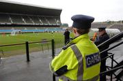 15 August 2006; A member of the Garda looks on during Republic of Ireland squad training. Lansdowne Road, Dublin. Picture credit; David Maher / SPORTSFILE