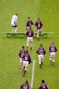 12 August 2006; The Westmeath players make their way to the bench for a team photograph. Bank of Ireland All-Ireland Senior Football Championship, Quarter-Final, Dublin v Westmeath, Croke Park, Dublin. Picture credit; Ray McManus / SPORTSFILE