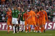 16 August 2006; Republic of Ireland captain Steven Reid walks away as the Netherlands players celebrate their side's third goal. International Friendly, Republic of Ireland v Netherlands, Lansdowne Road, Dublin. Picture credit; Brian Lawless / SPORTSFILE