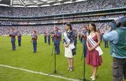 12 August 2006; Dublin Rose, Sarah Gilmartin, left, and Westmeath Rose Edle O'Connor sing the national anthem 'Amhran na bhFiann' before the match. Bank of Ireland All-Ireland Senior Football Championship, Quarter-Final, Dublin v Westmeath, Croke Park, Dublin. Picture credit; Damien Eagers / SPORTSFILE