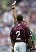 12 August 2006; Referee Brian Crowe issues the yellow card to Westmeath's Damien Healy. Bank of Ireland All-Ireland Senior Football Championship, Quarter-Final, Dublin v Westmeath, Croke Park, Dublin. Picture credit; Damien Eagers / SPORTSFILE