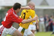 12 August 2006; Kevin McGourty, Antrim, in action against Peter McGinnity, Louth. Tommy Murphy Cup, Semi-Final, Louth v Antrim, St. Brigid's Park, Dowdallshill, Dundalk, Co. Louth. Picture credit; Ray Lohan / SPORTSFILE